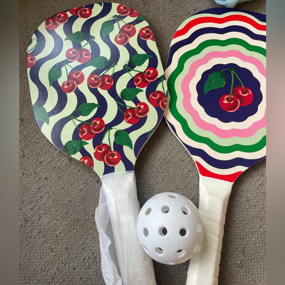Anthropologie pickle ball set. Includes two racquets, one ball, storage bag